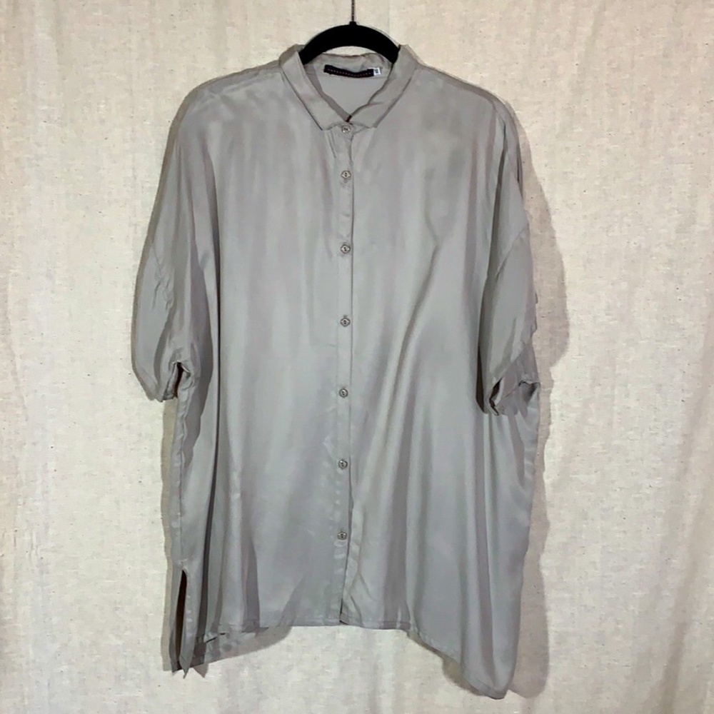 Oversized soft and flowing short sleeve top.